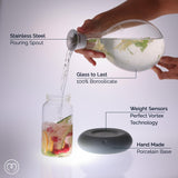 MAYU Swirl Carafe | Hand-Blown Glass – Enhances Oxygenation & Taste, Creates Structured Water w/Natural Swirl, BPA-Free Lid, Ideal as Bedside Carafe & Filter Pitcher Alternative | 51 oz (Earth Base)