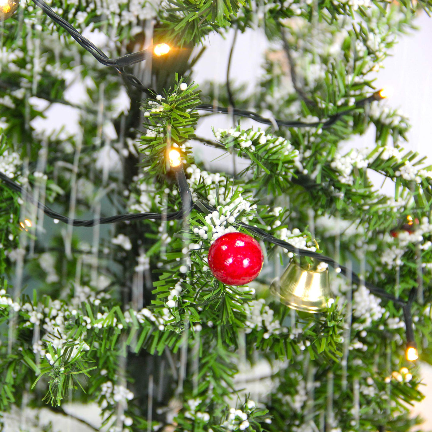 Fraser Hill Farm 29-in. Snowing Musical Christmas Tree with Warm White LED Lights, 25 Christmas Carols, Decorations, Star Topper, and Red Umbrella Base, Festive Xmas Decor for Foyer and Family Room