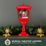 Fraser Hill Farm 29-in. Snowing Musical Christmas Tree with Warm White LED Lights, 25 Christmas Carols, Decorations, Star Topper, and Red Umbrella Base, Festive Xmas Decor for Foyer and Family Room